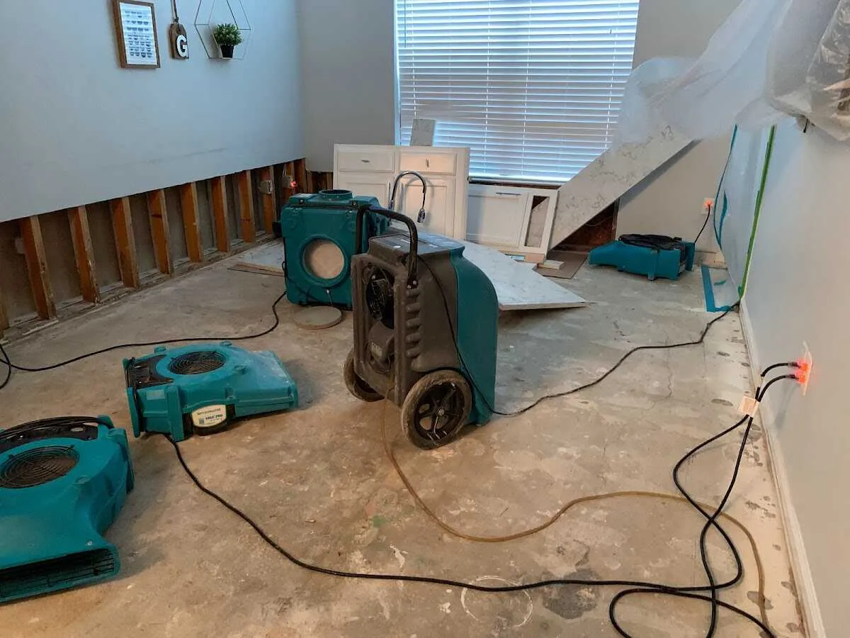 Dehumidifier in flood-cut room for Water Damage Restoration in Valinda